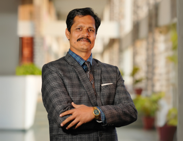 DR. DHANANJAY R. MISHRA